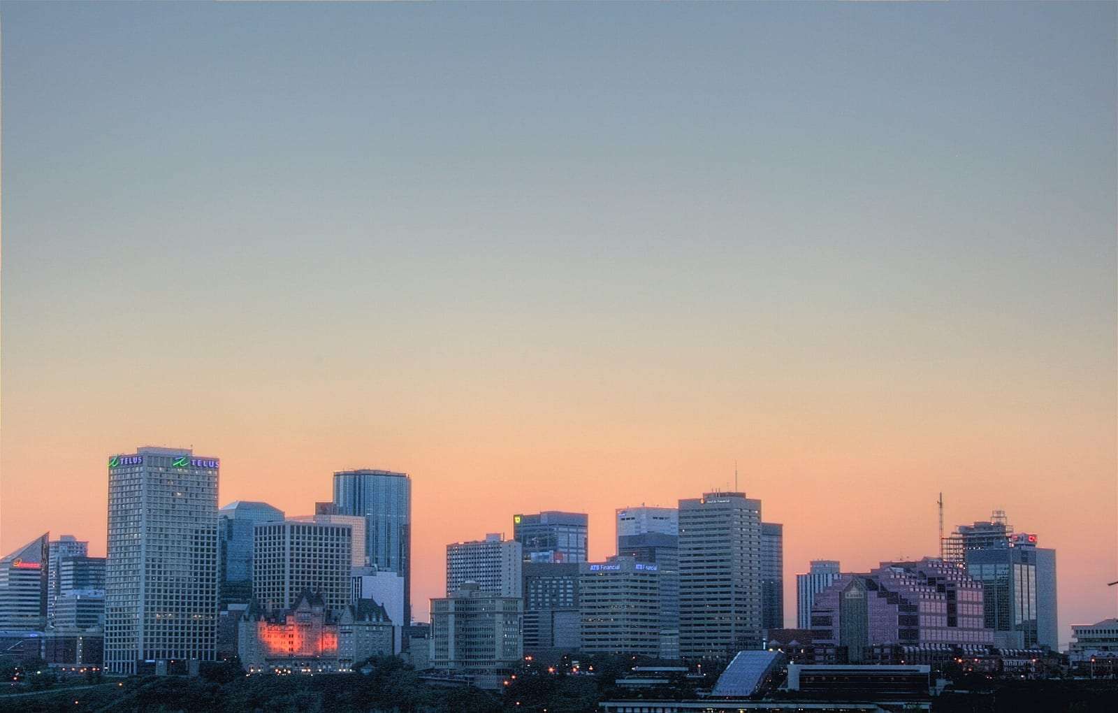 Downtown Edmonton skyline at sunset, seen across the river valley from Strathearn