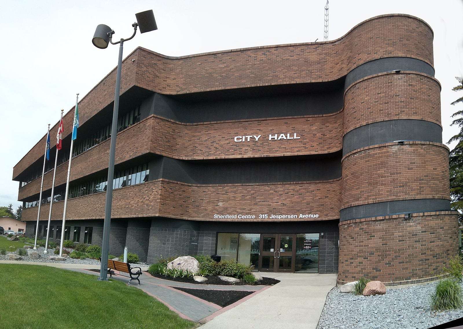 Spruce Grove City Hall, a curved brick building, in Spruce Grove, Alberta