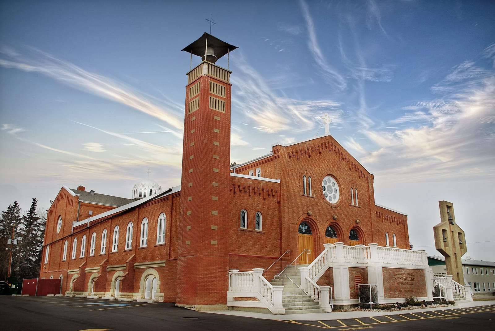 St. Albert Parish, a red brick church with a bell tower, in St. Albert, Alberta